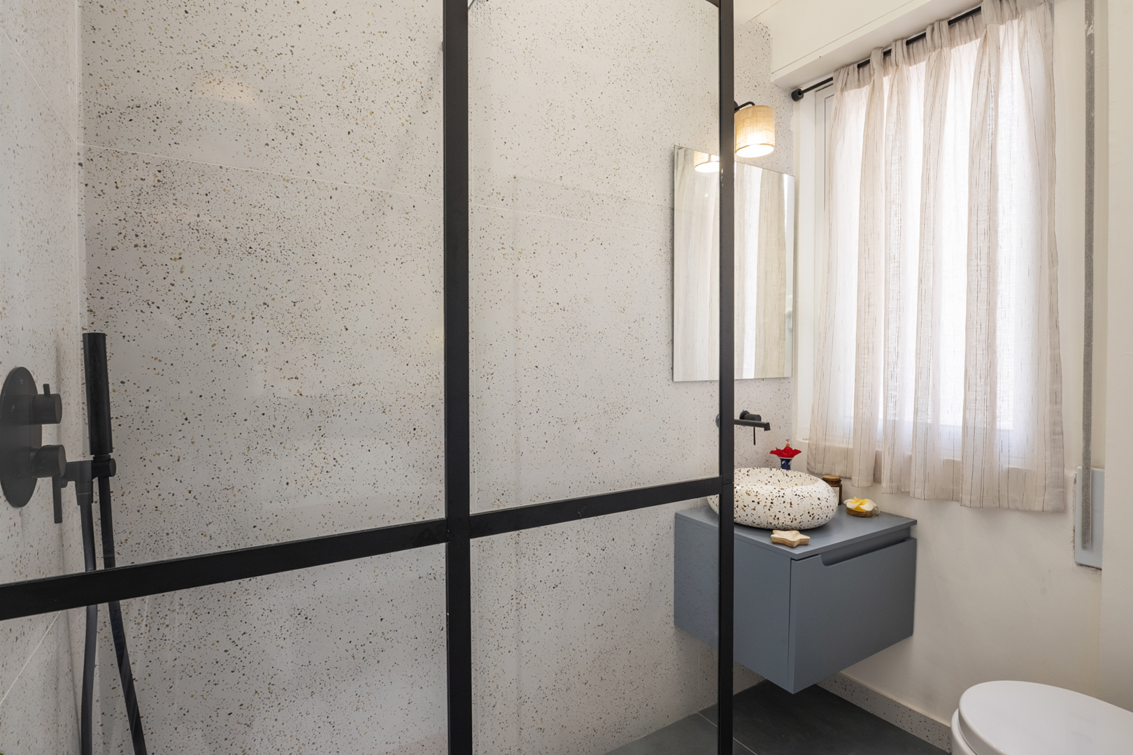 Bathroom detail with modern tiles and fixtures
