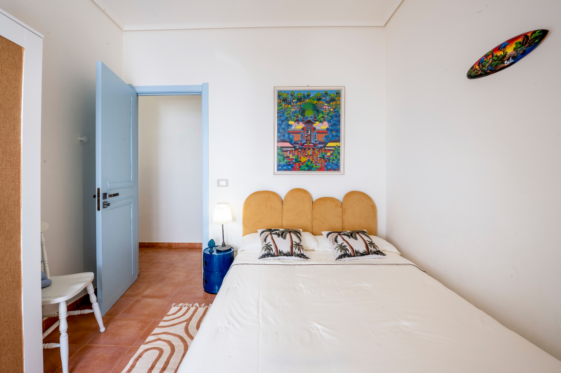 Bali-inspired bedroom with warm tones and soft fabrics